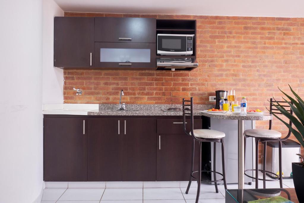 Kuchyň nebo kuchyňský kout v ubytování Hemma Bogotá Chapinero Premium Suites Hotel