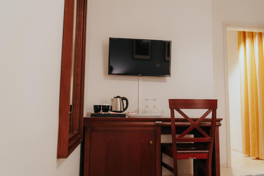TV a/nebo společenská místnost v ubytování 1909 Guesthouse