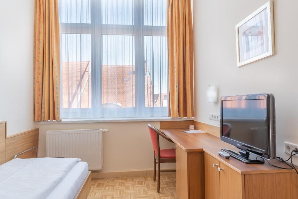 TV a/nebo společenská místnost v ubytování Hotel Kindler 2,0 Self-Check-In