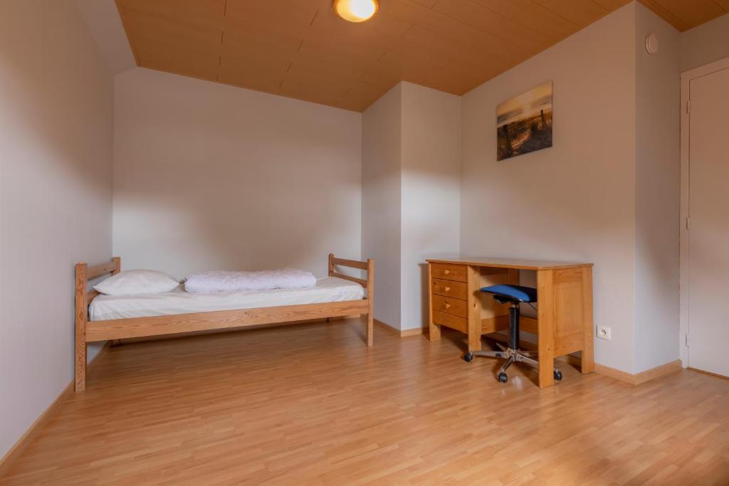 Postel nebo postele na pokoji v ubytování Villa At Home
