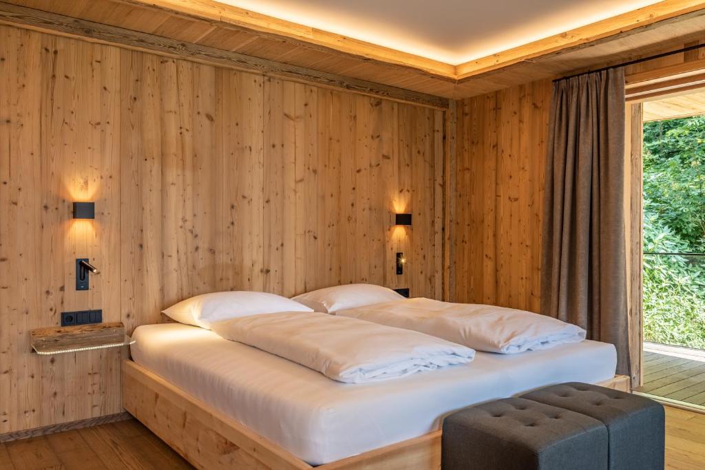 Voodi või voodid majutusasutuse Chalet Residenz Zillertal Mühlermoos toas