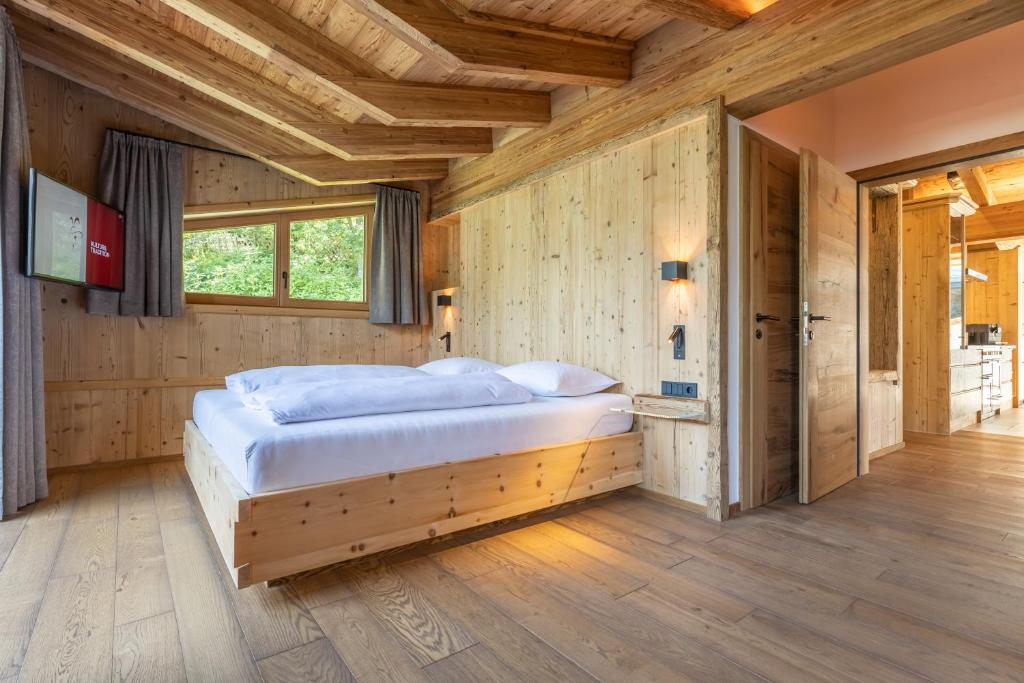 Voodi või voodid majutusasutuse Chalet Residenz Zillertal Mühlermoos toas