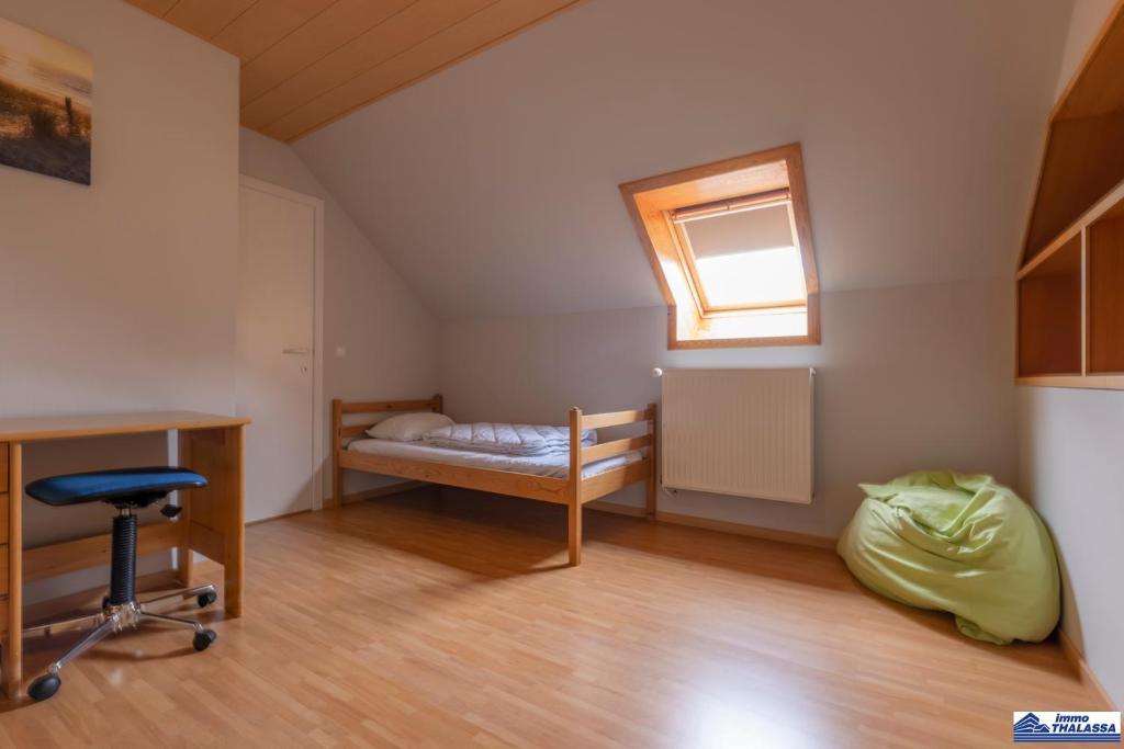 Postel nebo postele na pokoji v ubytování Villa At Home