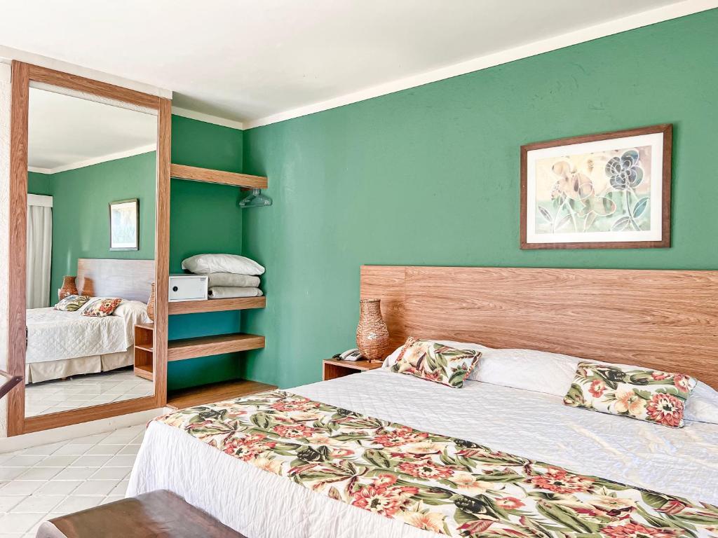 Cama ou camas em um quarto em Hotel do Bosque ECO Resort