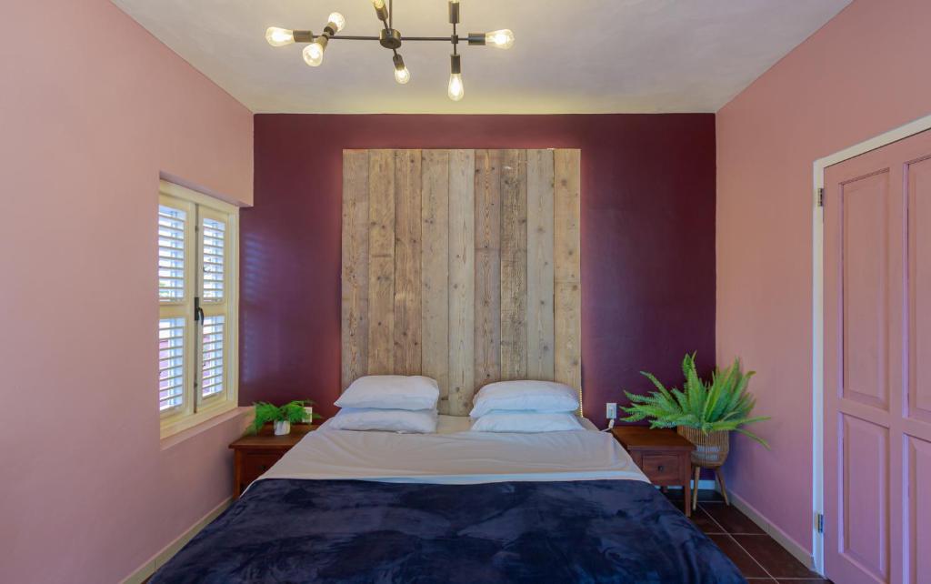 Postel nebo postele na pokoji v ubytování Atelier Skalo Boutique Hotel