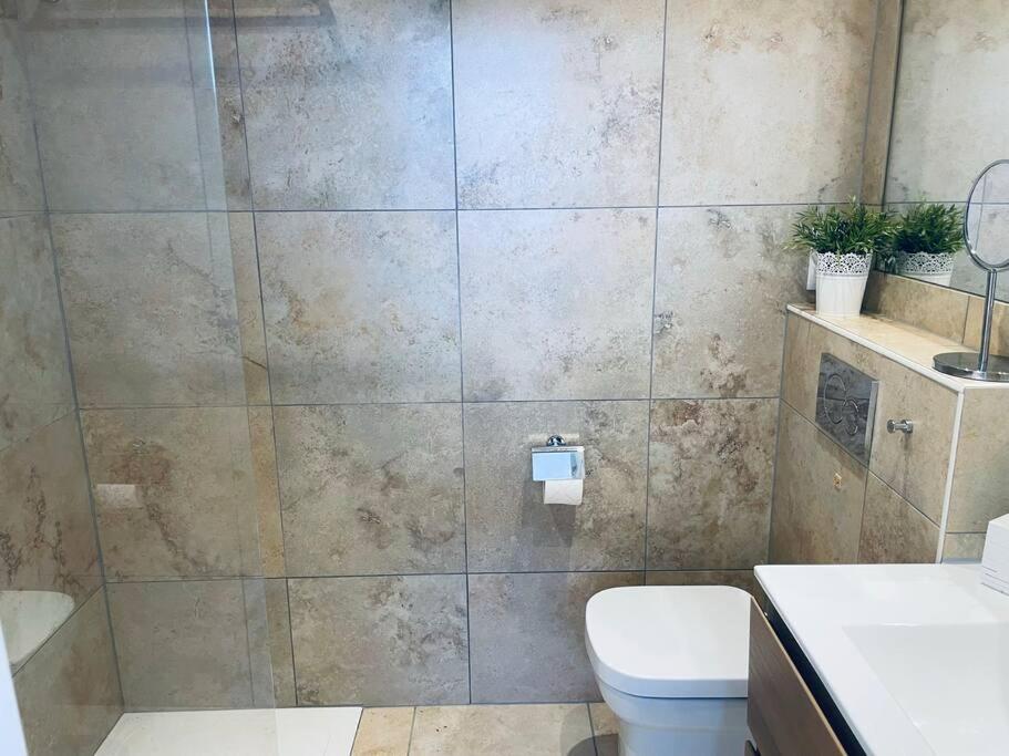Ein Badezimmer in der Unterkunft Apartment Mananem