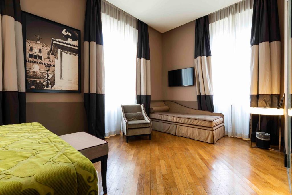 TV a/nebo společenská místnost v ubytování Rome Times Hotel