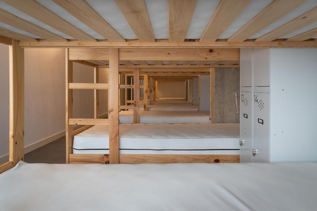 Postel nebo postele na pokoji v ubytování Ekoos Hostel, Bilbao Eko Hostel