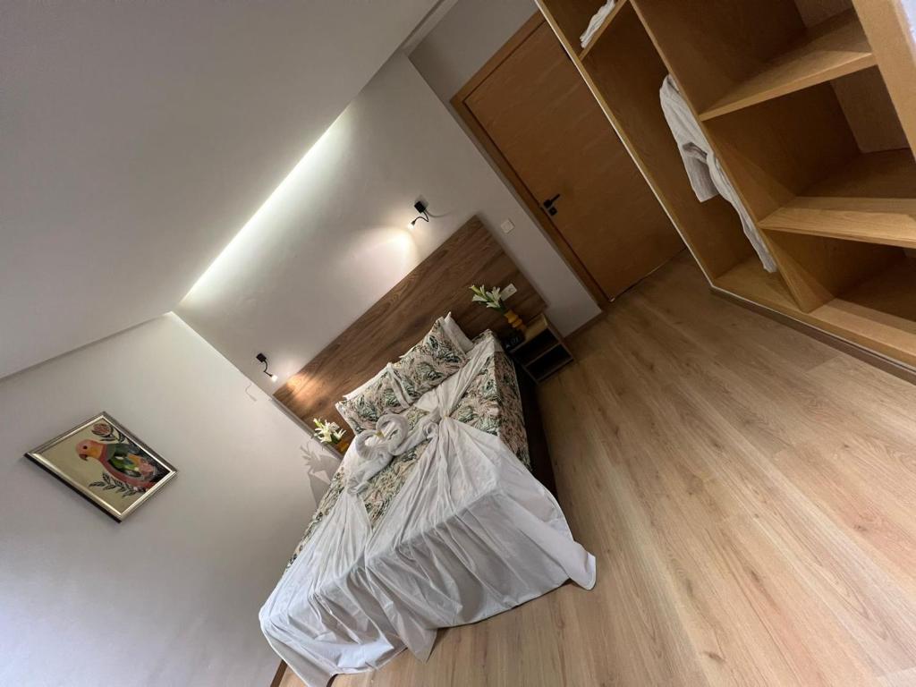Postel nebo postele na pokoji v ubytování Hotel beaux arts