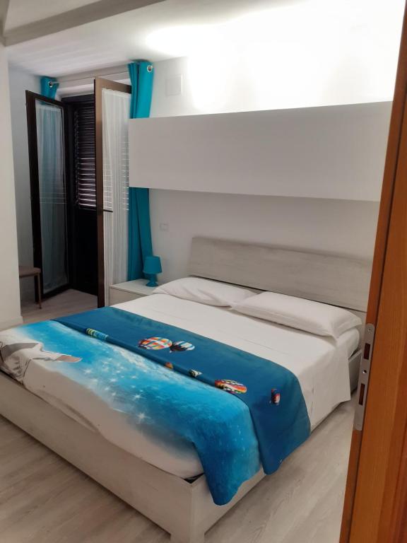 Posteľ alebo postele v izbe v ubytovaní VASTO centro Alloggio 1-2-3