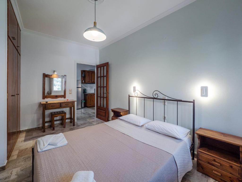Postel nebo postele na pokoji v ubytování Pandora's Corfu Apartments