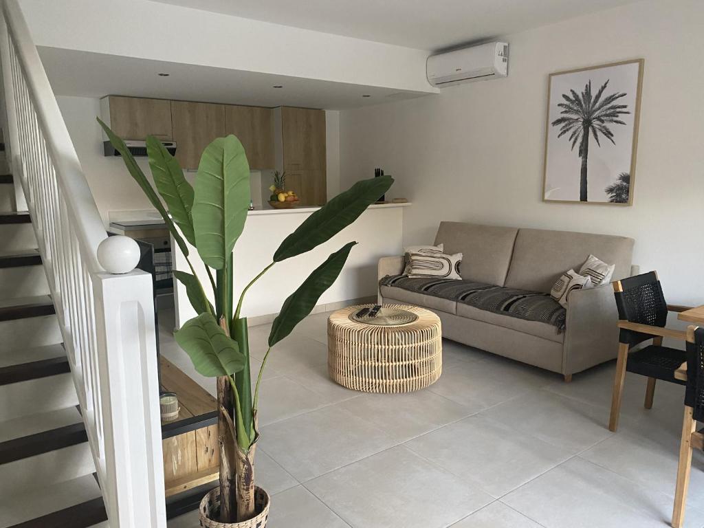 Posezení v ubytování Cottage Cosy Duplex Anse Marcel, Vue mer et marina