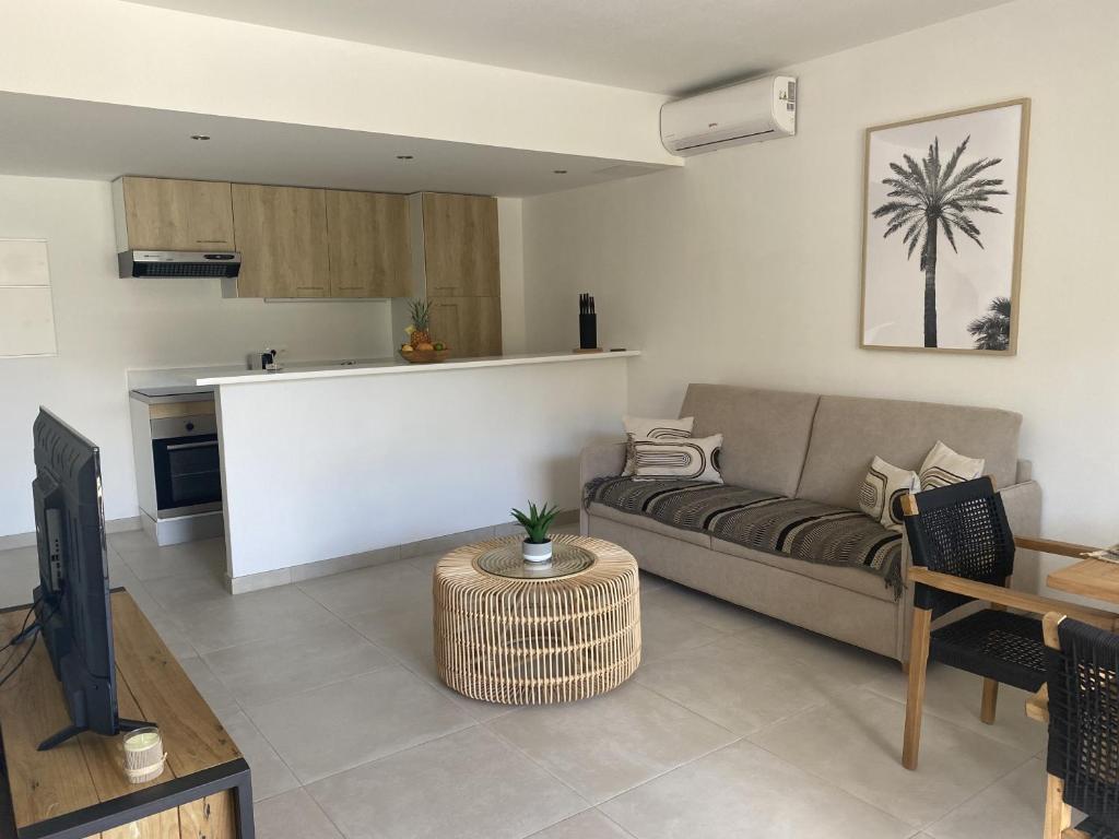 Posezení v ubytování Cottage Cosy Duplex Anse Marcel, Vue mer et marina