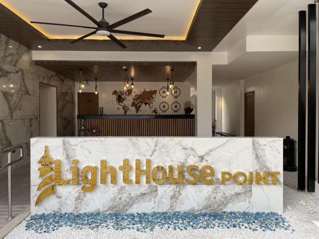 Um certificado, prémio, placa ou documento mostrado em Lighthouse Point Hotel