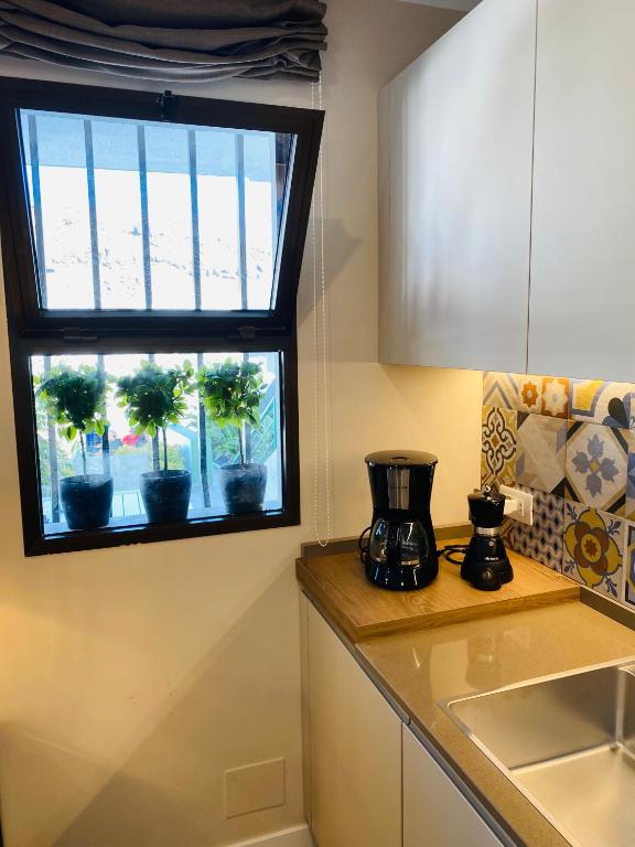 A kitchen or kitchenette at A.M. LUXURY HOME IN PUERTO RICO
