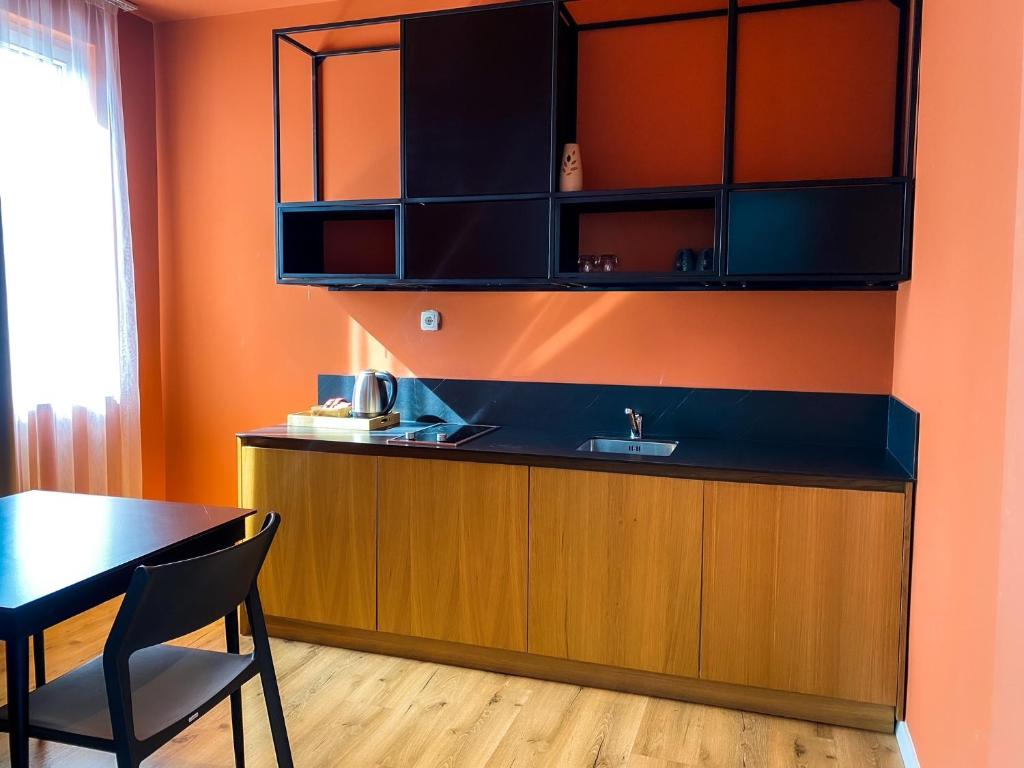 Kuchyň nebo kuchyňský kout v ubytování Swiss Apartments Prishtina