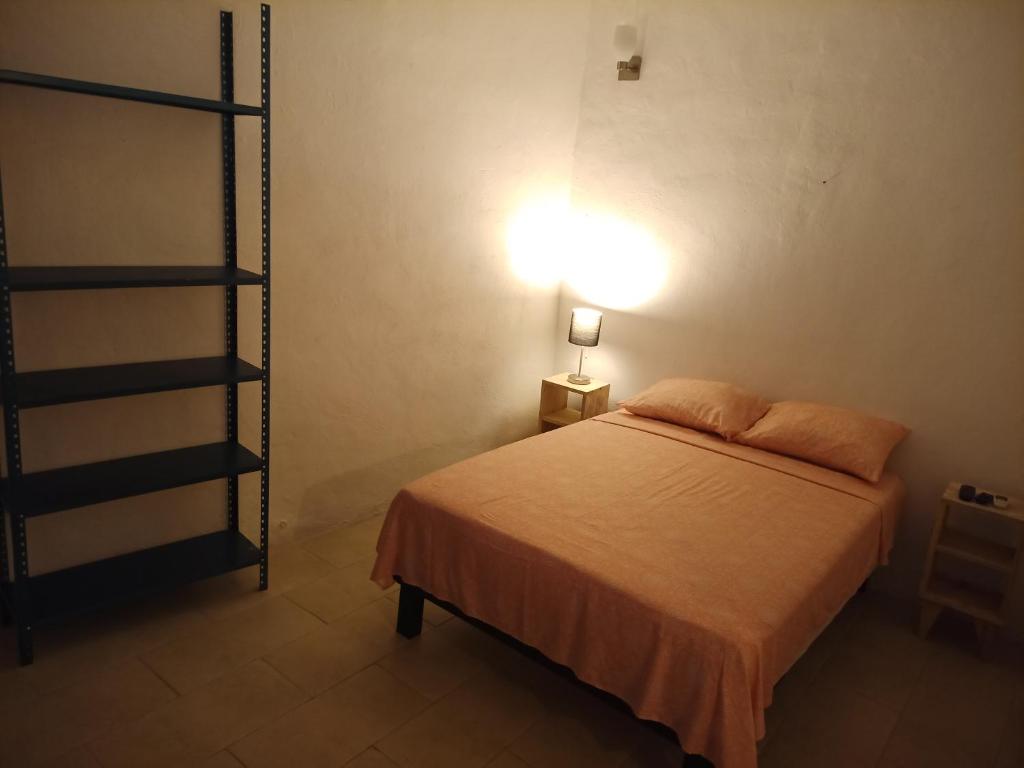 Ліжко або ліжка в номері Casa Carmita (Casa Patricia)