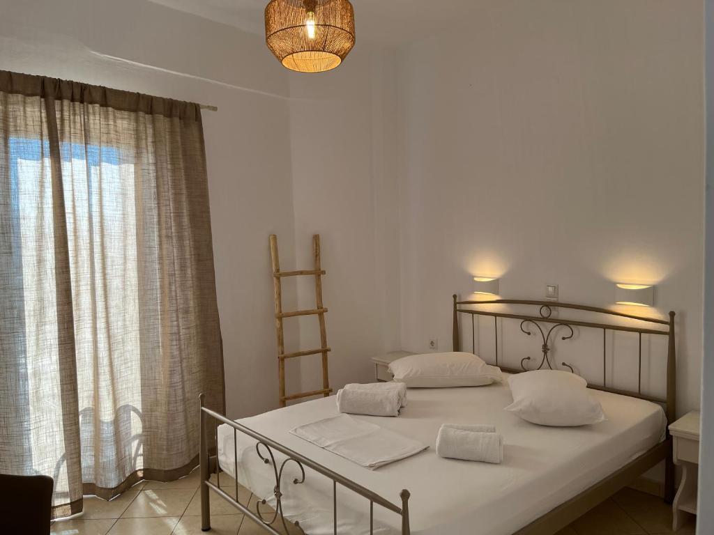 Postel nebo postele na pokoji v ubytování Hotel Chrisoula