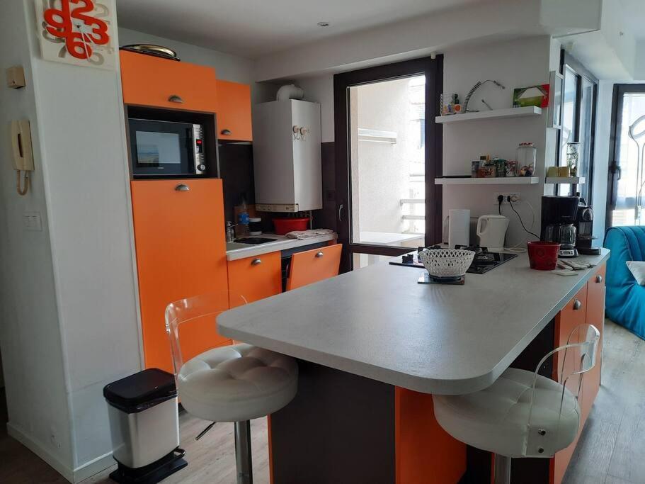 Kuchyňa alebo kuchynka v ubytovaní Appartement 10 mins Intra Muros