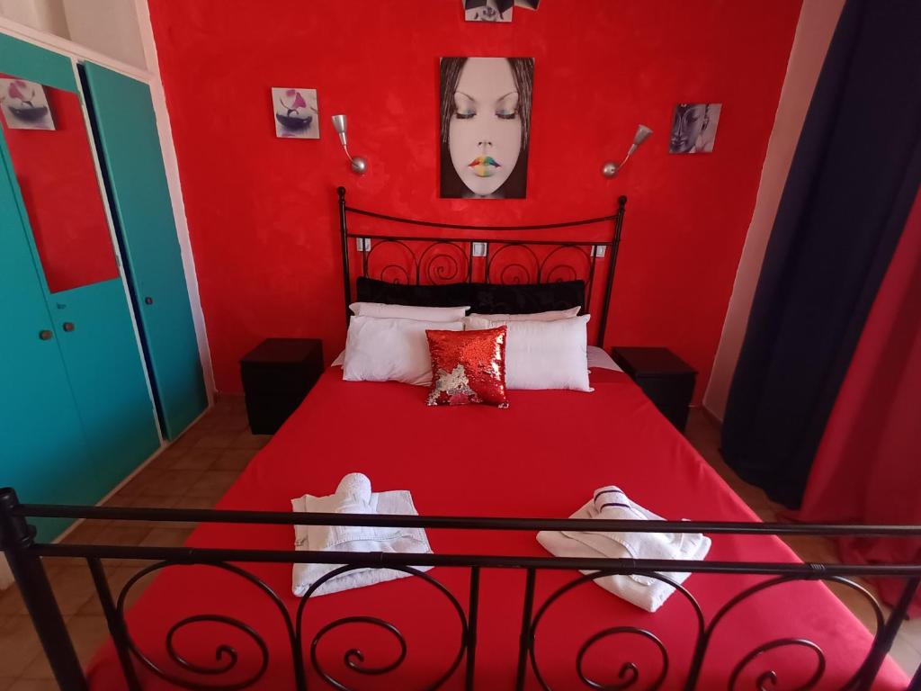 Postel nebo postele na pokoji v ubytování Art Studios Benitses