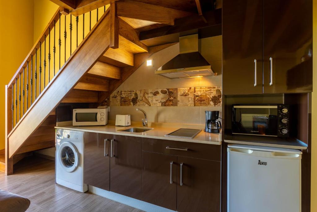 Kuchyň nebo kuchyňský kout v ubytování Villas Verdemar