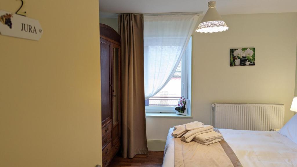 Postel nebo postele na pokoji v ubytování Chambres d'Hotes CASCAROT