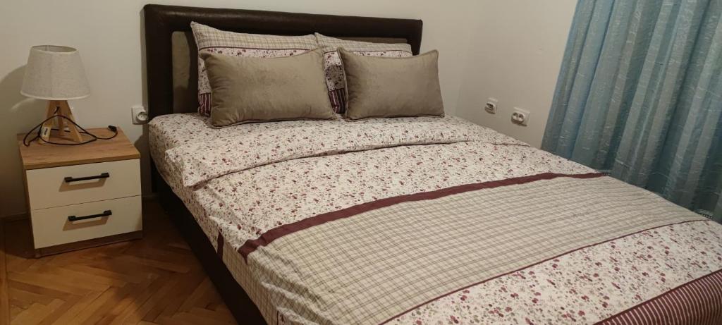 Ένα ή περισσότερα κρεβάτια σε δωμάτιο στο Apartman Stojanovic