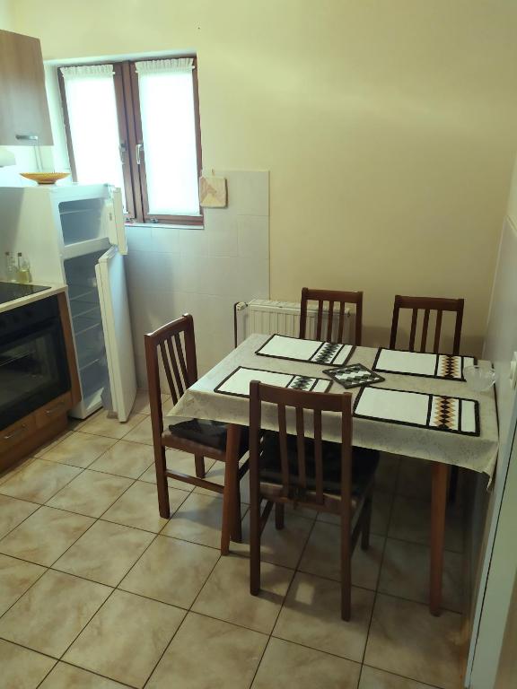 Kuchyň nebo kuchyňský kout v ubytování Apartman Verona