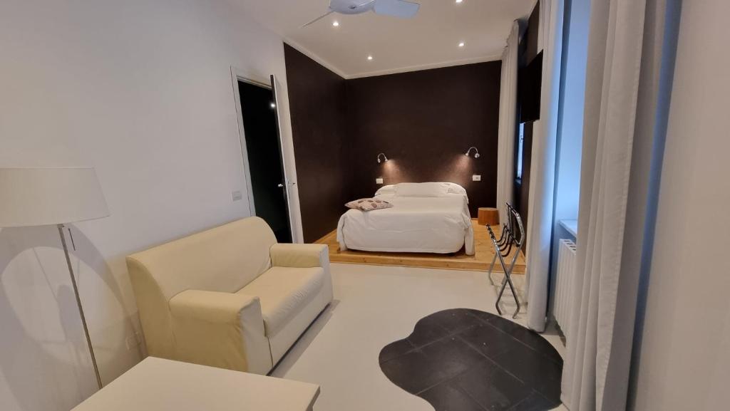 Postel nebo postele na pokoji v ubytování Albergo Ristorante Trieste Boves