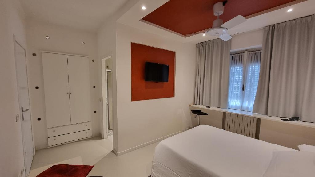 Postel nebo postele na pokoji v ubytování Albergo Ristorante Trieste Boves
