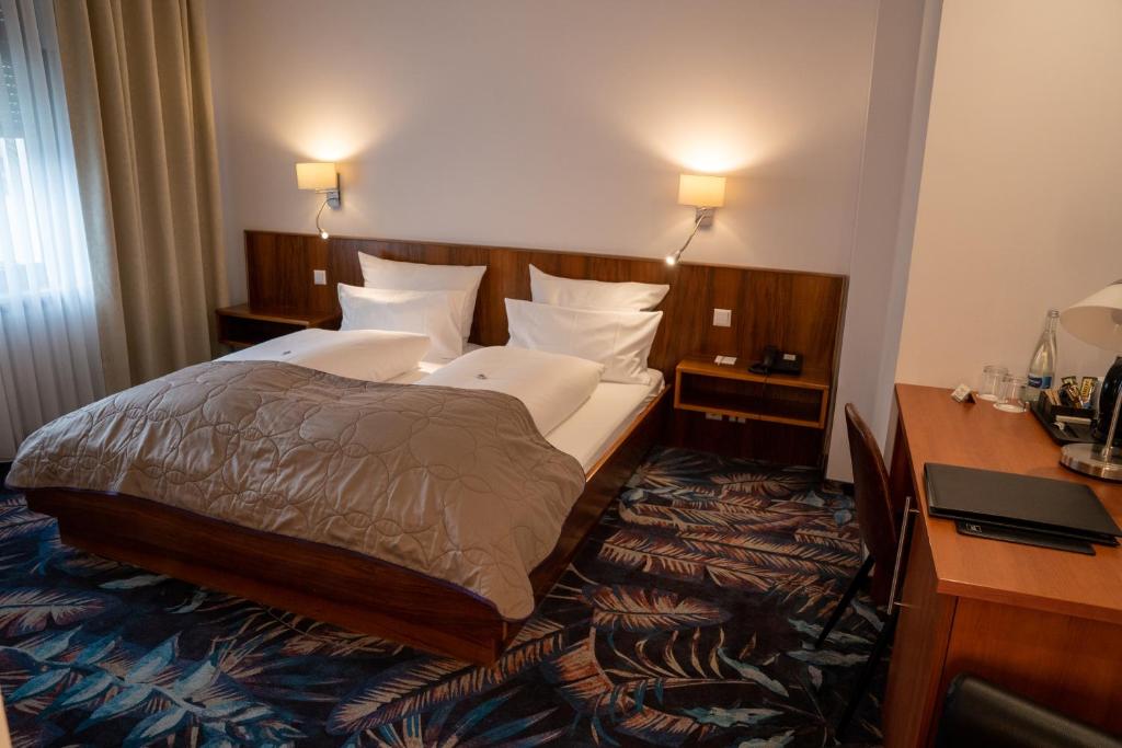 Postel nebo postele na pokoji v ubytování Hotel Etol - Superior