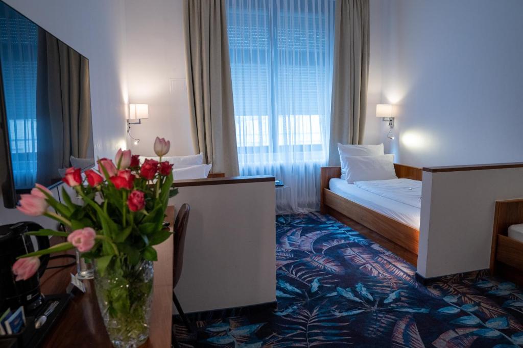 Postel nebo postele na pokoji v ubytování Hotel Etol - Superior