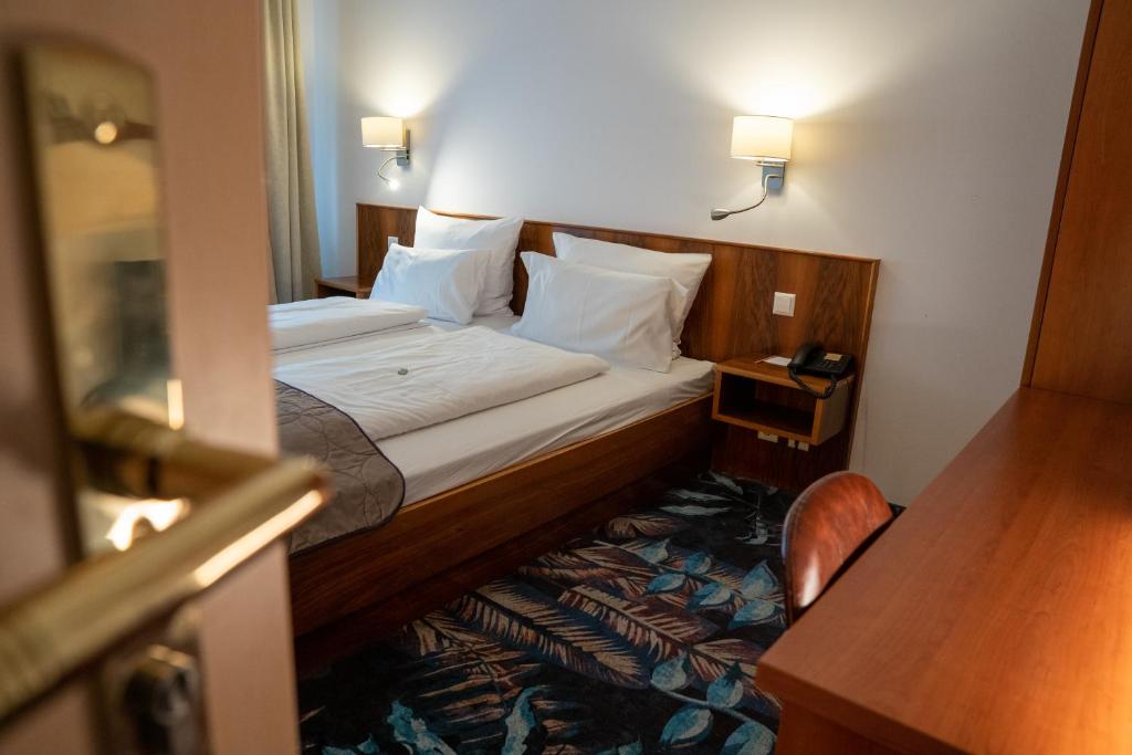 Postel nebo postele na pokoji v ubytování Hotel Etol - Superior