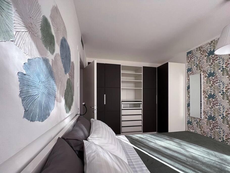 Ένα ή περισσότερα κρεβάτια σε δωμάτιο στο Zurigo 3 Lovely Apartment