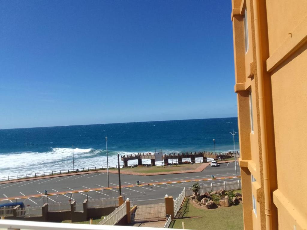 a view of the ocean from a balcony of a building at Jordy 1 your home away from home in Margate