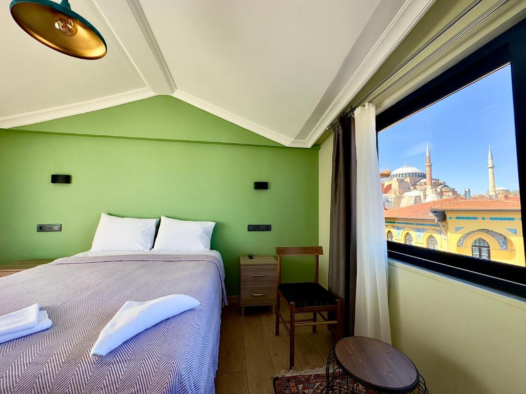 Postel nebo postele na pokoji v ubytování Terrace Guesthouse