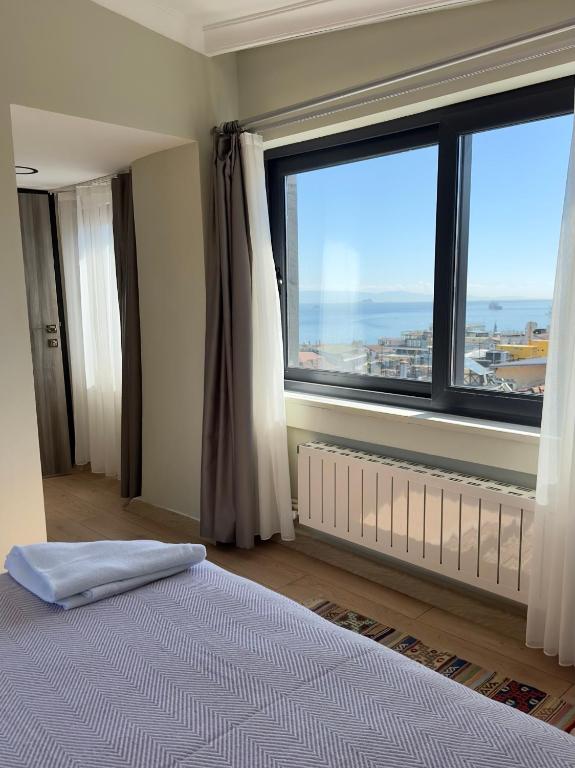 Postel nebo postele na pokoji v ubytování Terrace Guesthouse