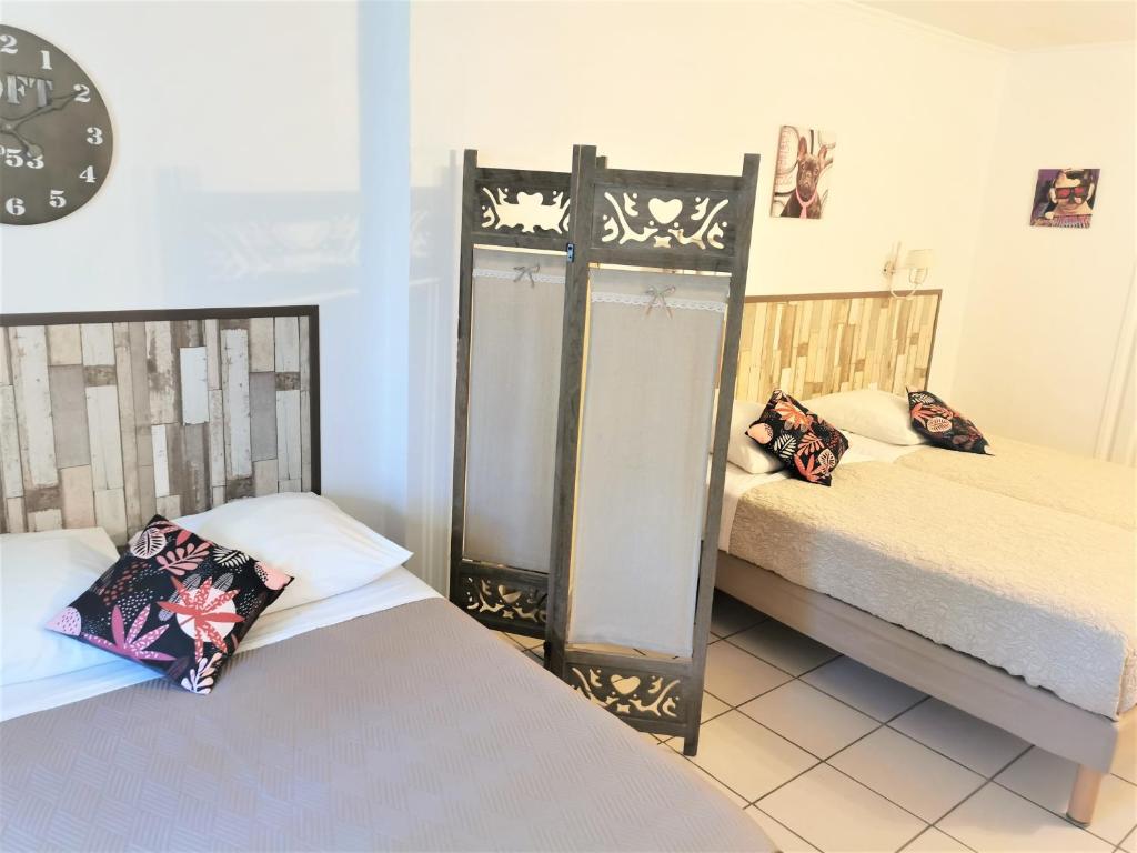 Postel nebo postele na pokoji v ubytování Hotel Lou Marquès