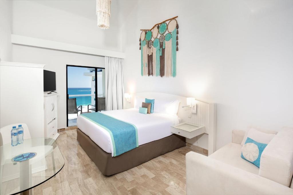 Postel nebo postele na pokoji v ubytování Cyan Cancun Resort & Spa