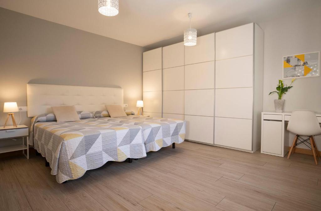Cama o camas de una habitación en Apartamentos Terraza Ega