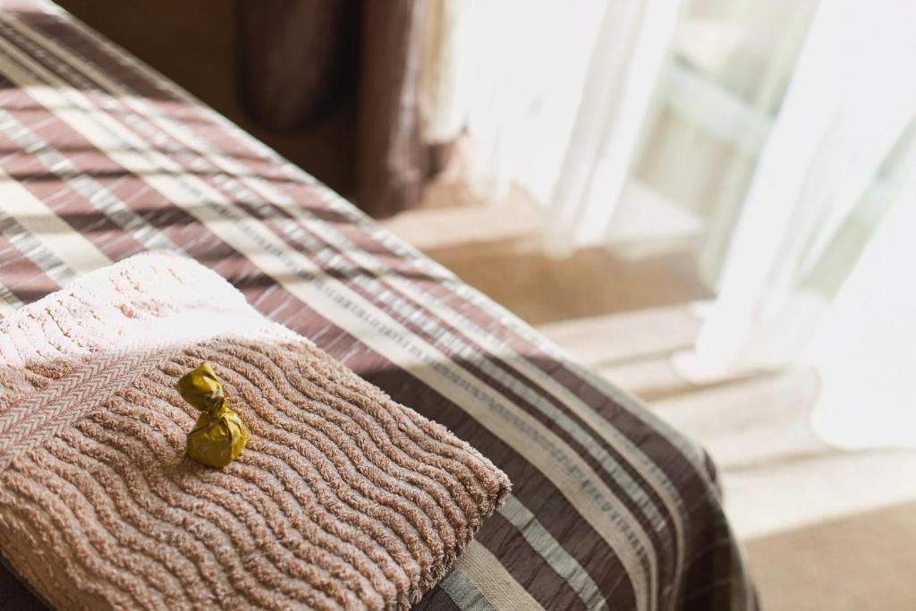 Posteľ alebo postele v izbe v ubytovaní Hotel Orlik