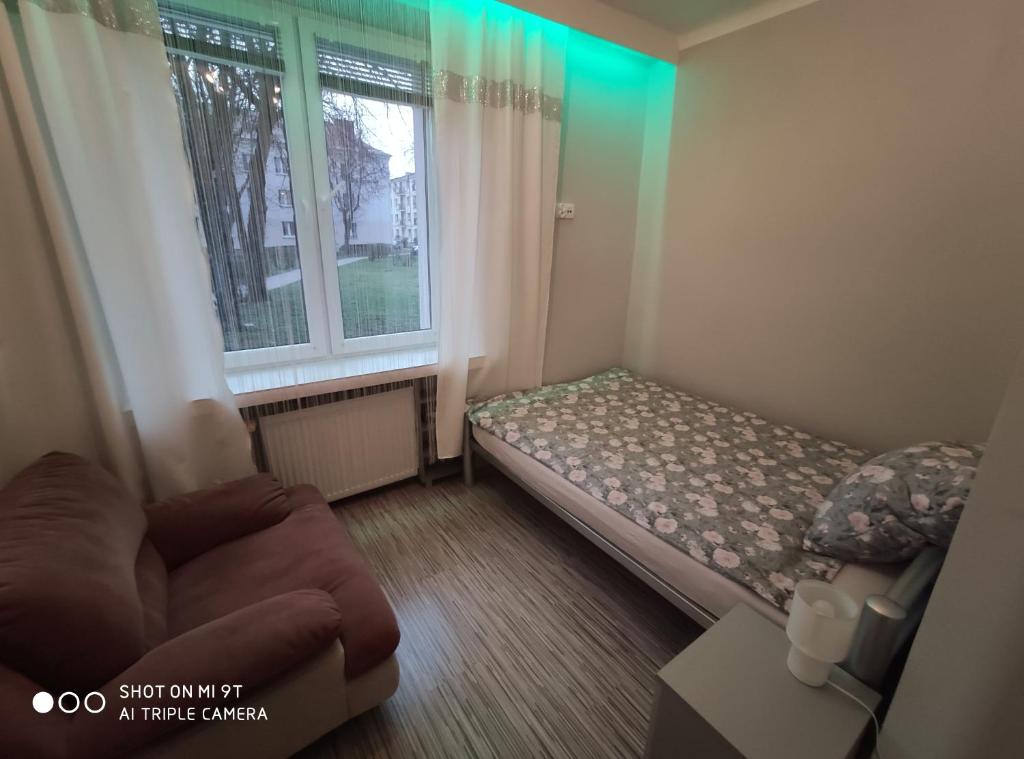 Postel nebo postele na pokoji v ubytování Apartament Centrum Kościuszko