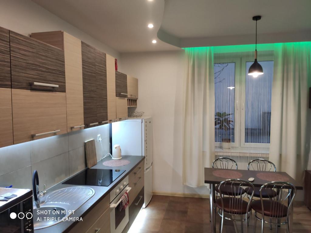 Kuchyň nebo kuchyňský kout v ubytování Apartament Centrum Kościuszko