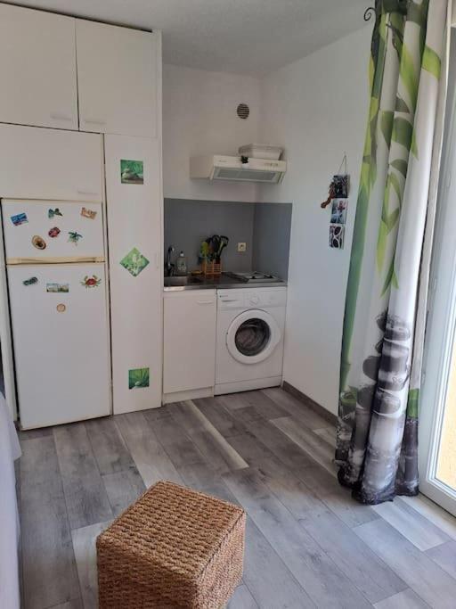 Kuchnia lub aneks kuchenny w obiekcie Coquet T2, Vue sur mer