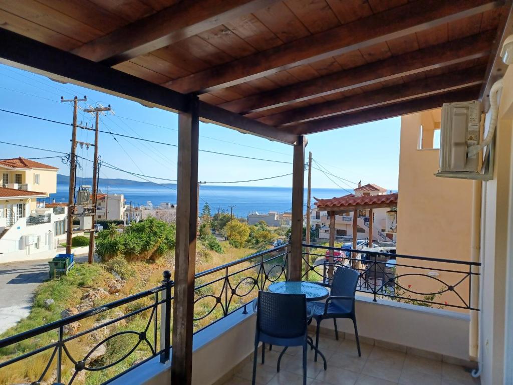 a balcony with a view of the ocean at Kanelli΄s apartments in Monemvasia