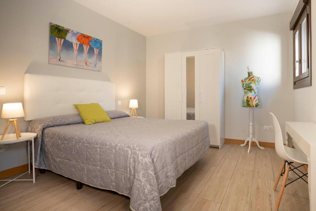 Cama o camas de una habitación en Apartamentos Terraza Ega