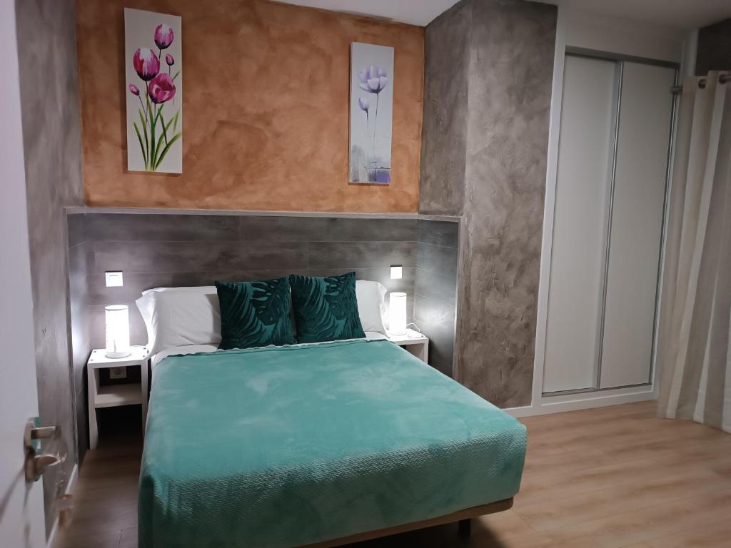 Postel nebo postele na pokoji v ubytování Hotel Alma Rosa