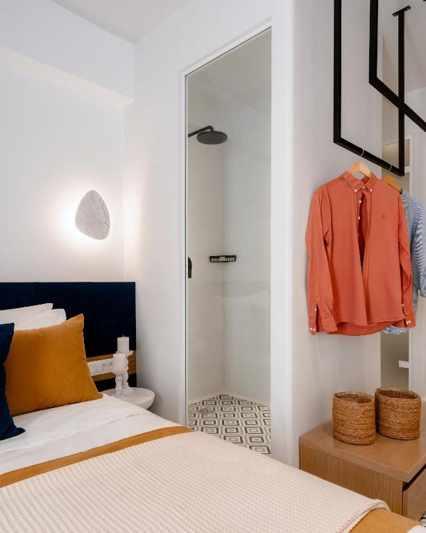 Postel nebo postele na pokoji v ubytování Margaret Luxury Suites