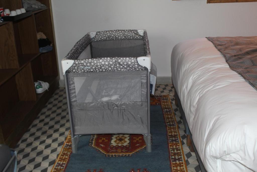 Postel nebo postele na pokoji v ubytování RIAD LUXE LOCATION le GRIZZLY