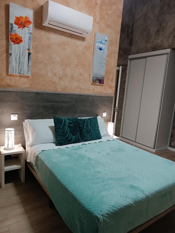 Postel nebo postele na pokoji v ubytování Hotel Alma Rosa